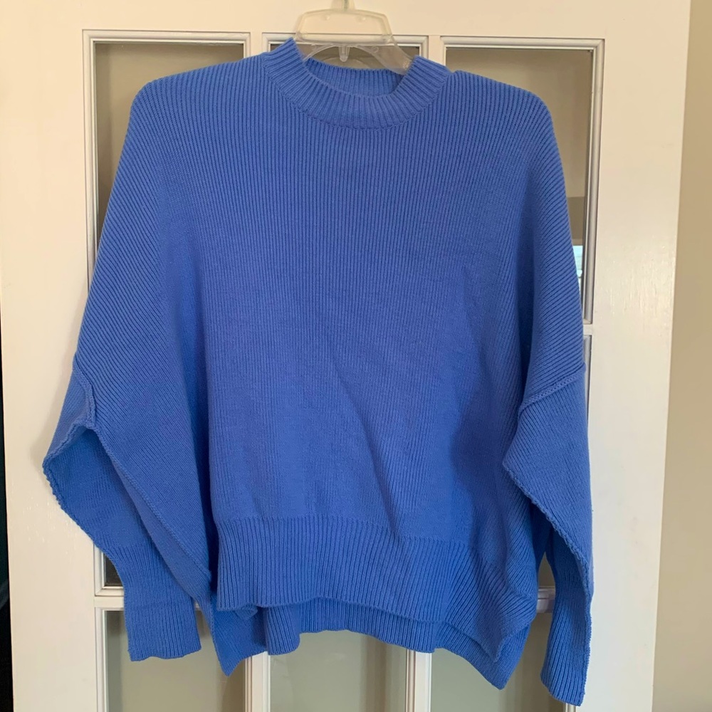Free People women’s sweater, size XS.